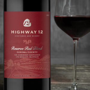 Highway 12 Reserve Red Blend bottle shot with glass of wine